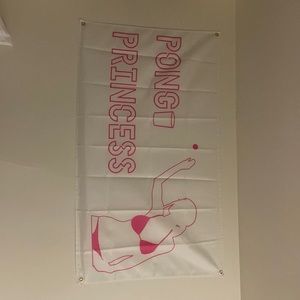Pink and shut “Pong Princess” dorm flag